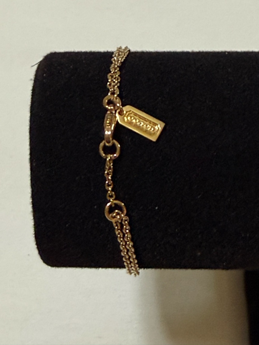 Coach Gold-Tone Circle Pendant Necklace with Crystal Accent - Picture 5 of 6